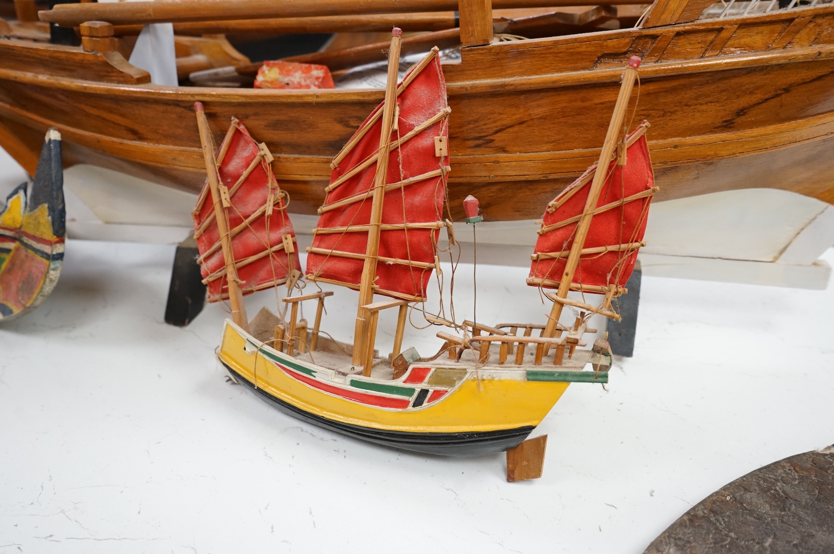 A model of a Chinese junk, a model ship and two other models of boats, largest 71cm in length